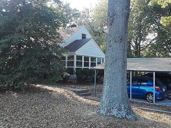 Side yard with 2 space carport