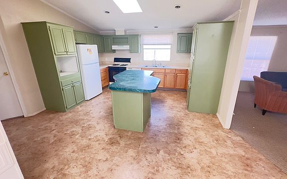 Kitchen. Skylight was removed when roof replaced.