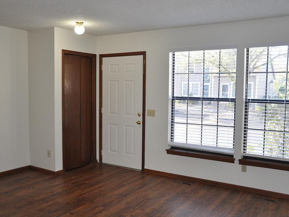 front room - front door and coat closet