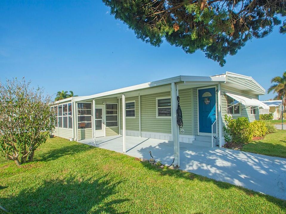 1st image of 309 NE Pinelake Village Boulevard