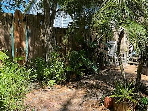 View of garden area and outdoor shower.