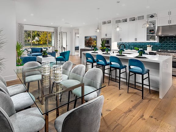 A photo of the dining space in the Plan 3 Model Home at Villas at Los Coyotes Country Club in Buena