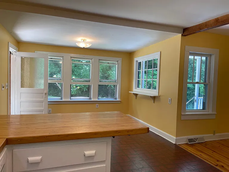 The dining area is generous and has lovely views through a "hobbit picture window".