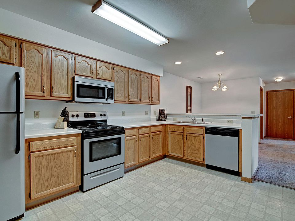 Arbor Ridge Kitchen View with Fridge, Oven, Microwave and Dishwasher