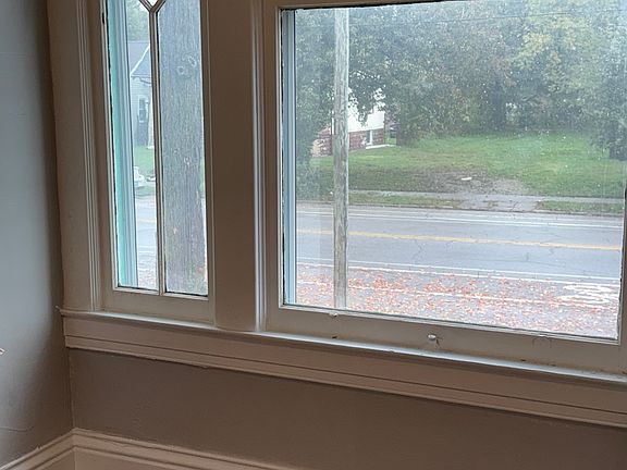 FRONT OF HOUSE, LIVING ROOM WINDOW