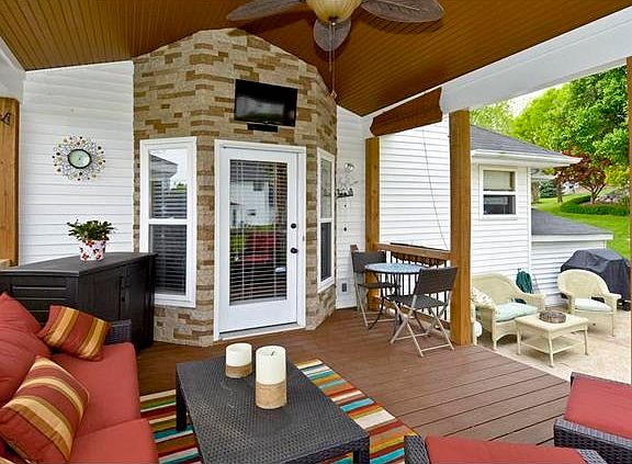 You will love relaxing on the new covered patio that also boast new composite decking, stone wall, a