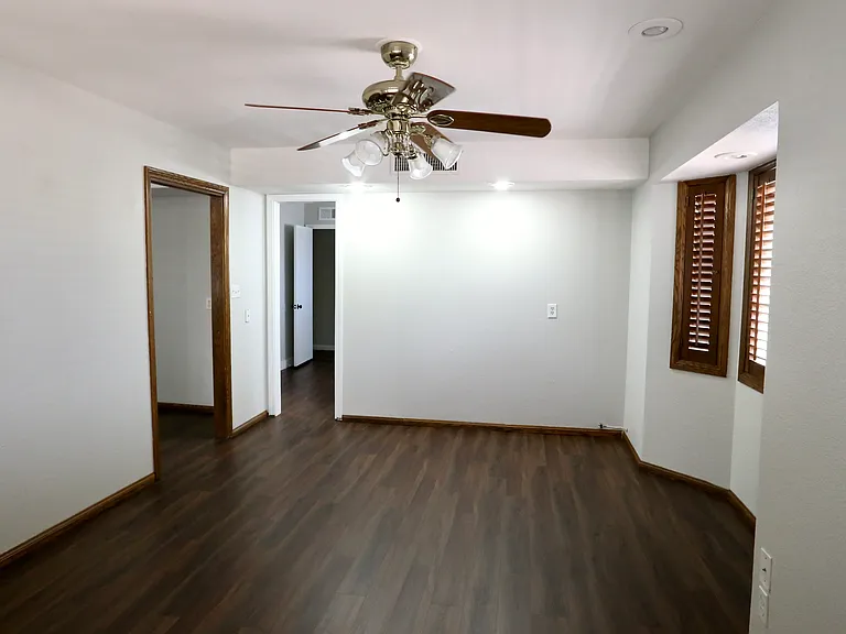 This is often used as a 5th bedroom or in combination with primary bed #2, since it has a private bath and there is a pocket door connecting them. There is another pocket door (brown frame) that leads to the additional front living room.