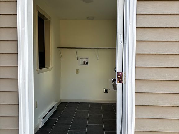 back entryway to kitchen/laundry hookup