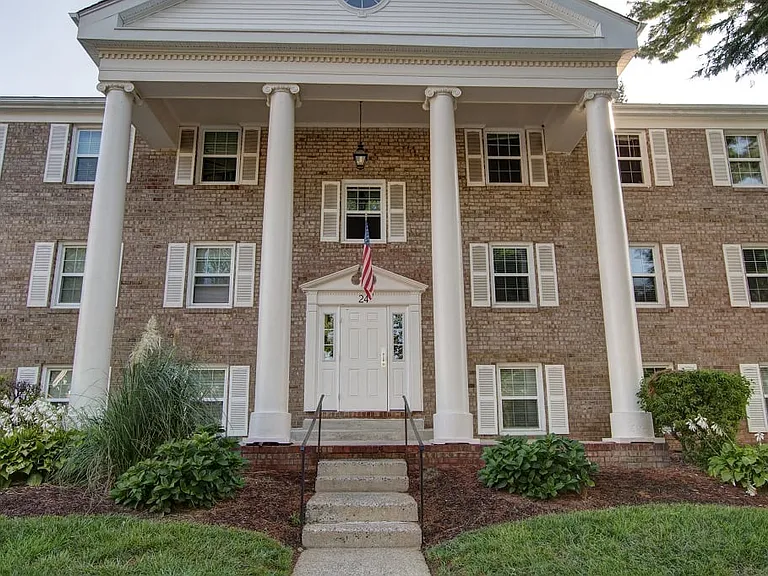 View of building exterior and landscape