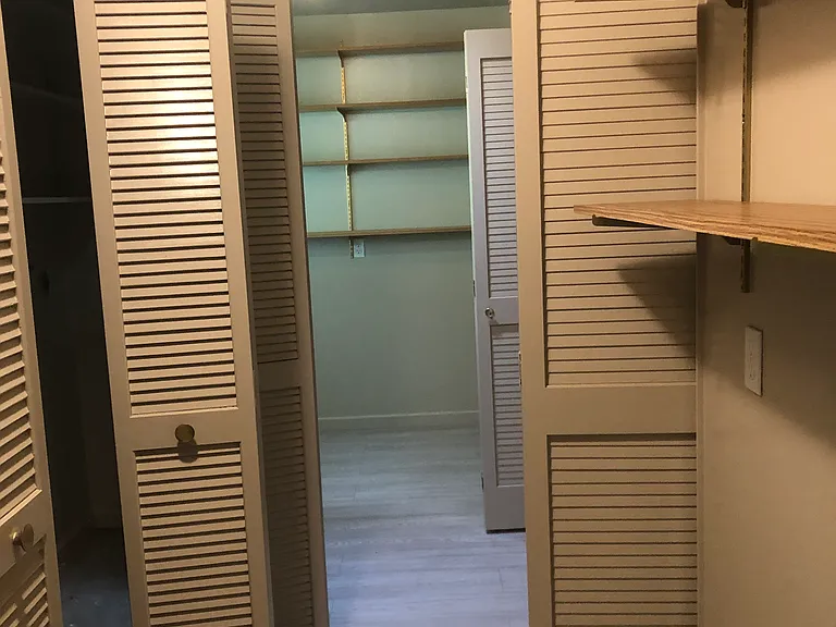 laundry area and 2 more closets
