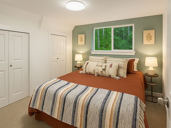This bedroom includes a queen bed, which is a relaxing space to unwind and enjoy a restful night
