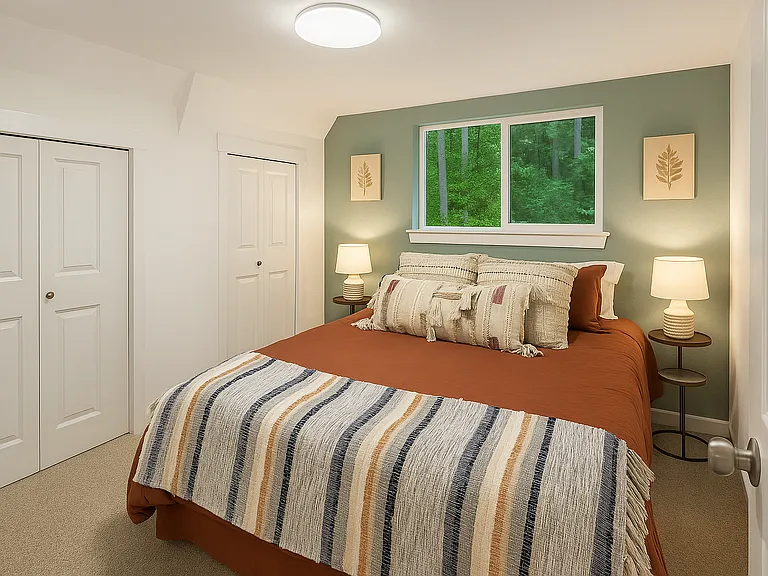 This bedroom includes a queen bed, which is a relaxing space to unwind and enjoy a restful night