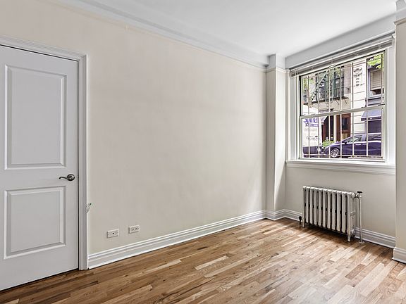 4th image of 25 E 10th St APT 1A