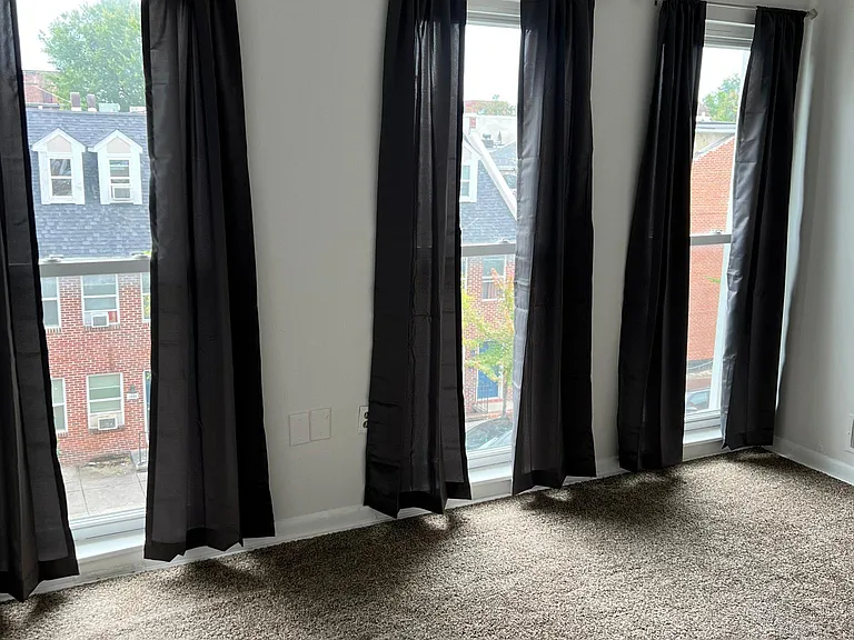 Make your way upstairs to the second floor and the 1st bedroom with floor to ceiling windows