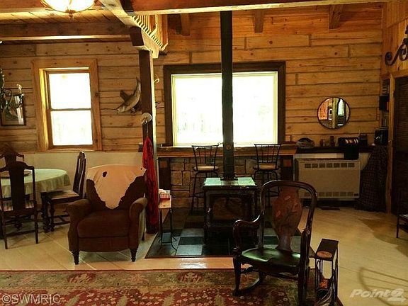 Woodstove warms the family room.