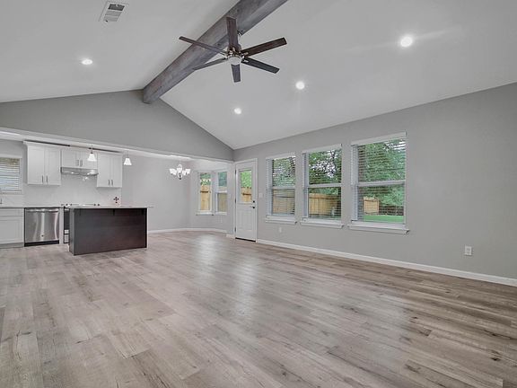 Living room looking into kitchen/dinning