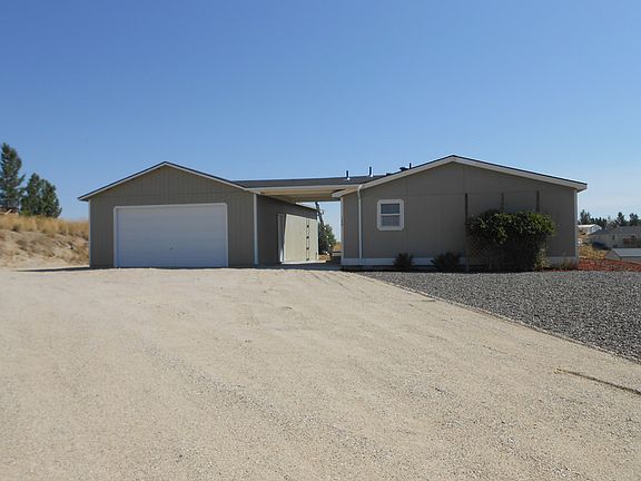 South view, breezeway to garage