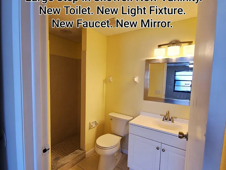 Upgraded master bathroom--New toilet, sink, light fixture, and moen faucet.