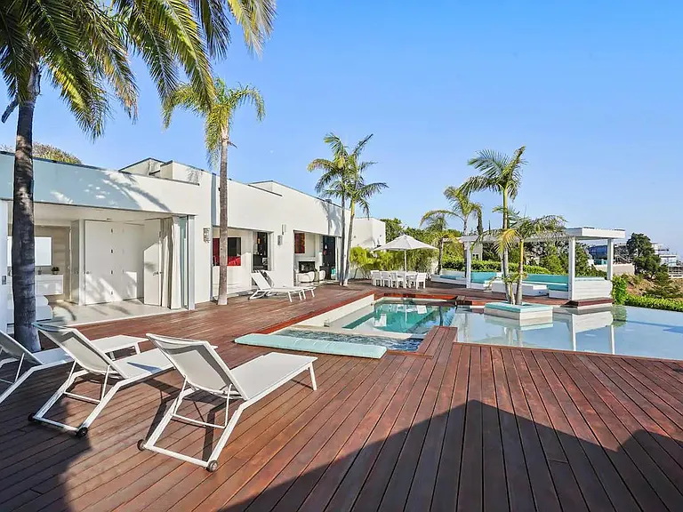 Lounge in style with the elegant designer deck furniture, ensuring comfort and sophistication during your outdoor retreat.