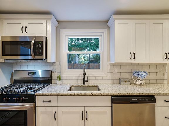 First floor kitchen overlooking the private backyard
