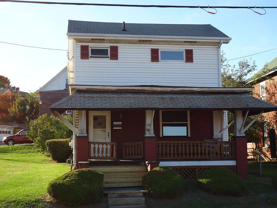 FRONT W/COMMERCIAL LOT ON LEFT