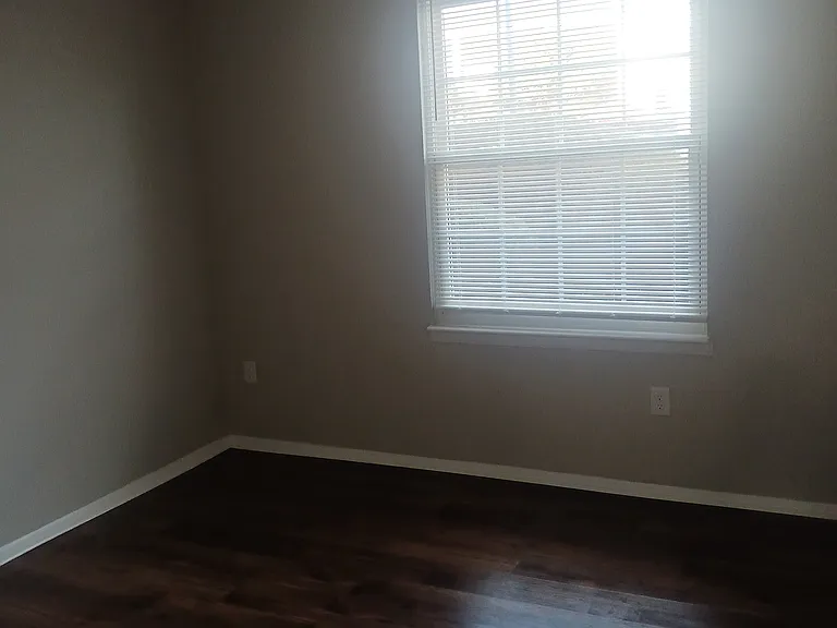 Second bedroom is 12x11 with 6-foot closet and large window.
