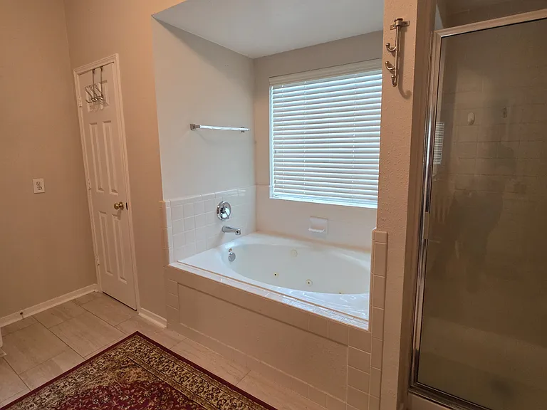 Primary bath with tub and shower