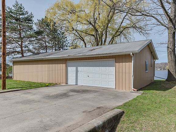 The polebarn 52 x 24 and was built in 2002. Lots of room for water toys and a workshop for Dad.