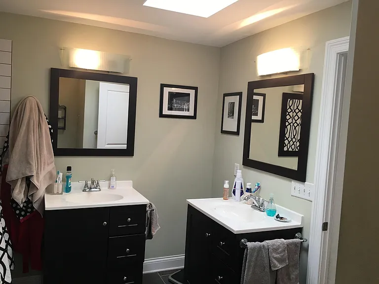 Second floor full bath, two separate vanities.