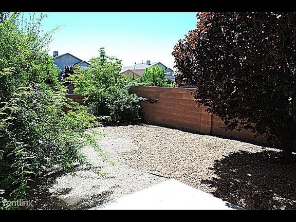 Private Backyard. Xeriscaped with drip system on timer.