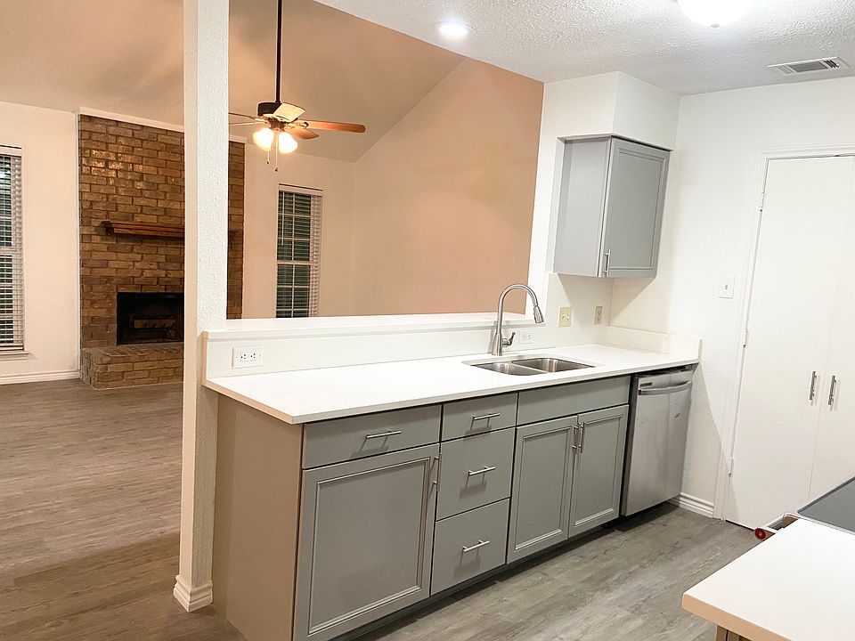 Open layout featuring living room, kitchen and dining