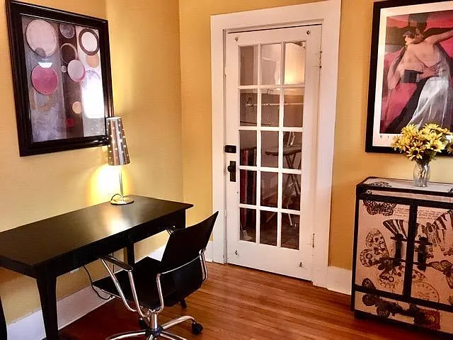 Foyer/study. Laundry room through white door.