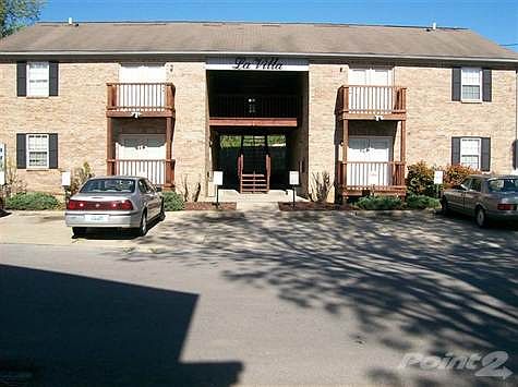 All Brick building with a private deck and parking spot for each apartment.