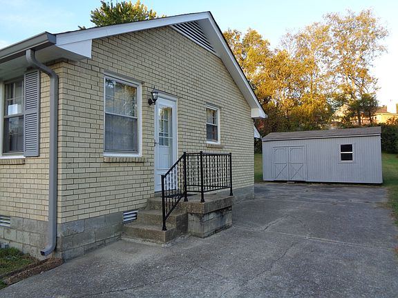 Side porch outside of exterior kitchen door.