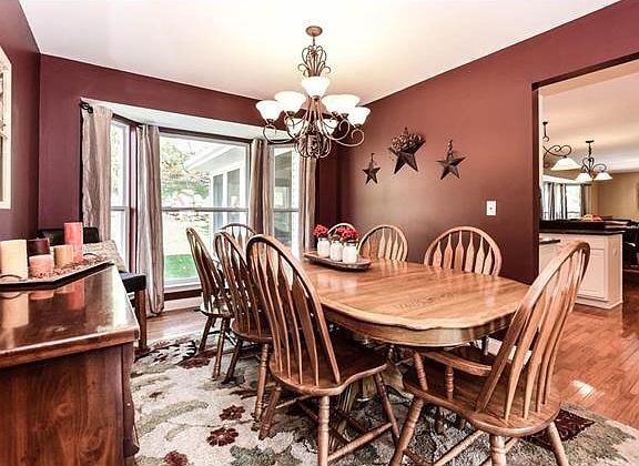 Gracious formal dining room perfect for family dinners & holiday celebrations.