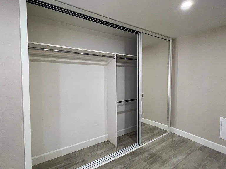 Bedroom 3 Triple Sliding Closet