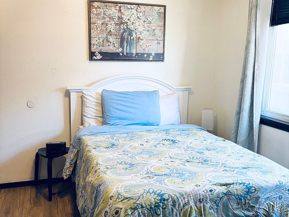 Private furnished full sized bed in bedroom