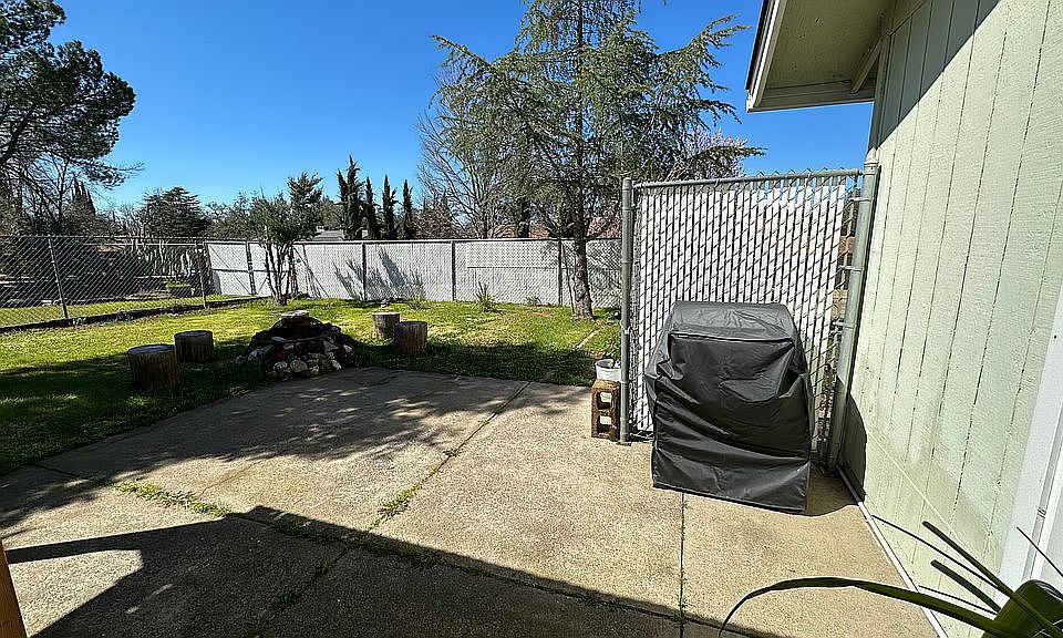 Patio-Fenced Backyard
