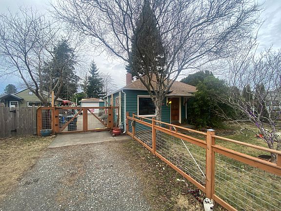 Driveway and front yard and front of house