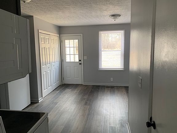 from Living Room to. eat-in Kitchen also featuring a laundry closet. There is also a pantry (not shown)