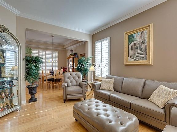 Formal living opens to formal dining room.