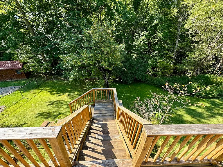 Back deck stairs to fenced in yard