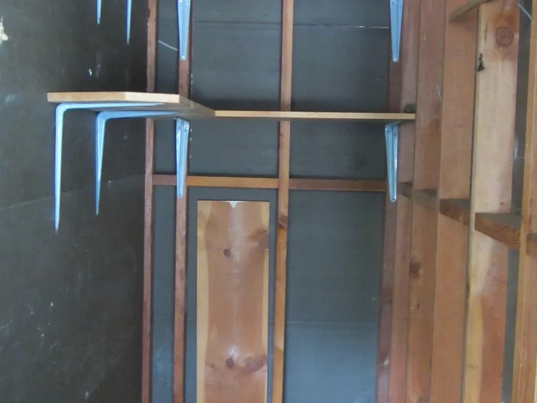 Large storage located at the parking carport.