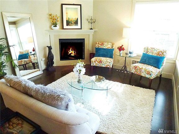 Spacious, open floor plan with corner fireplace.