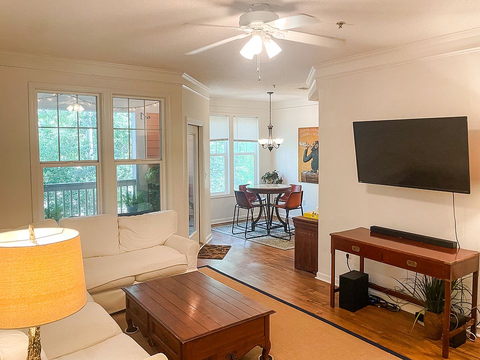 Living room, dining room and porch from just inside the front door.