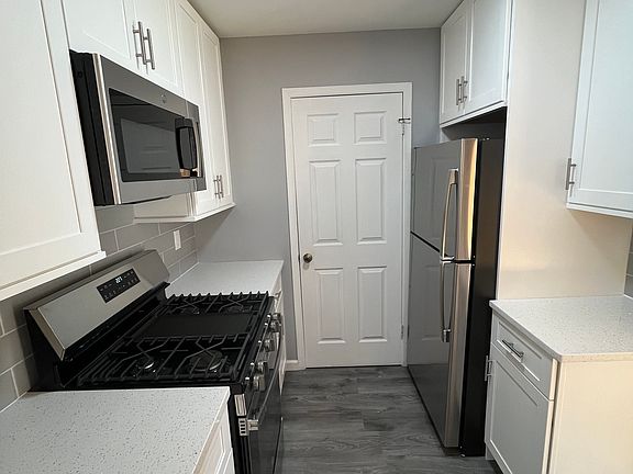 Renovated Kitchen & Laundry Room Behind Door