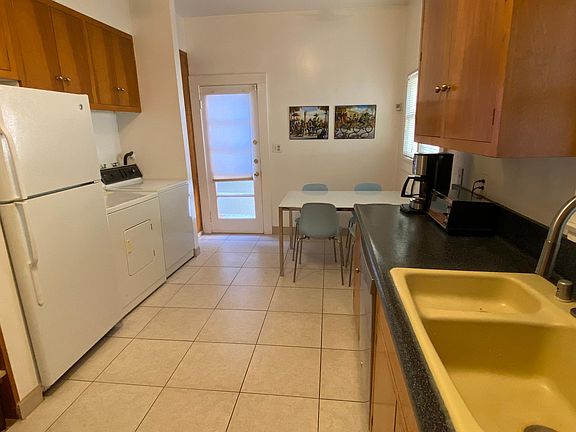 Rear entry into the house go directly into the kitchen area.