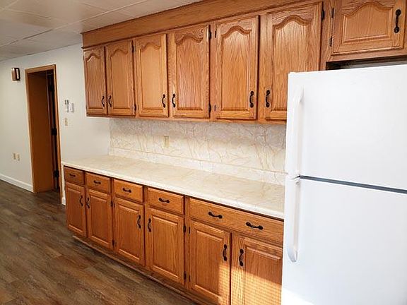 Kitchen has cabinets and countertop space galore!