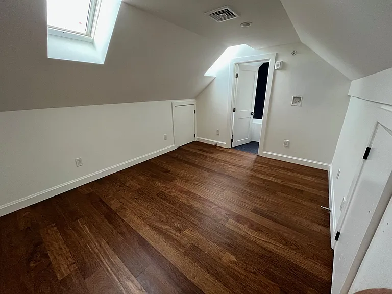 Master suite, with two remote-controlled skylights, en-suite bathroom, and huge closet (with its own skylight!).