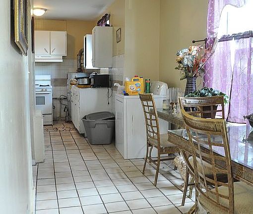 Foyer into kitchen, upstairs